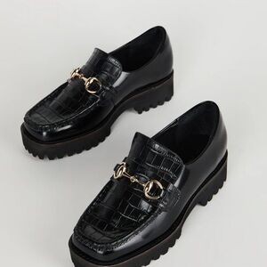 INTENTIONALLY BLANK Black Loafers with Gold Accents